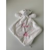Doudou brodé prénom Eva avec écriture rose et motif breton triskèle.