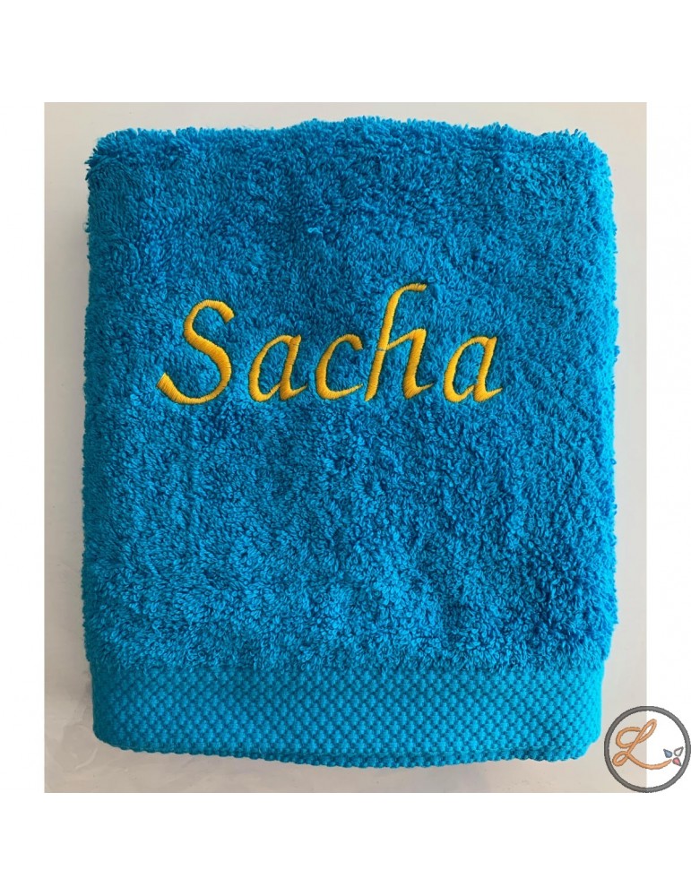 Serviette turquoise personnalisée prénom Sacha